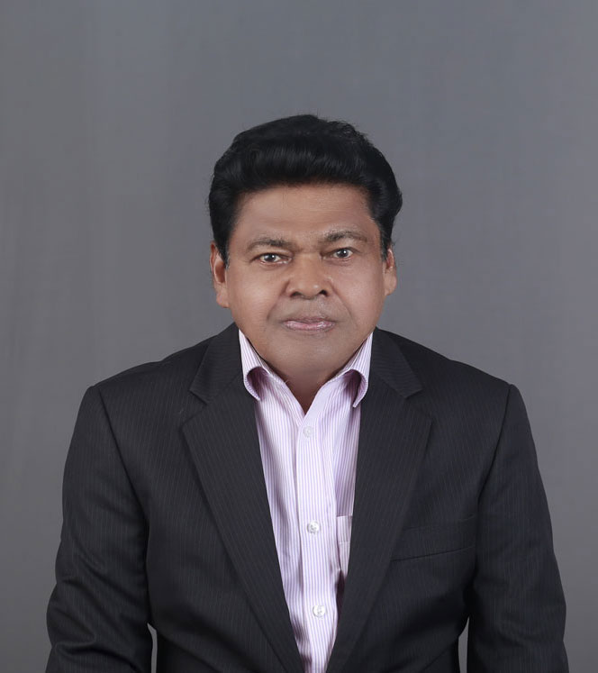 Dr. Raju M. Mathew